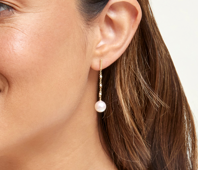 Model is wearing Estelle earrings with 8.5-9.0mm AAA quality pearls