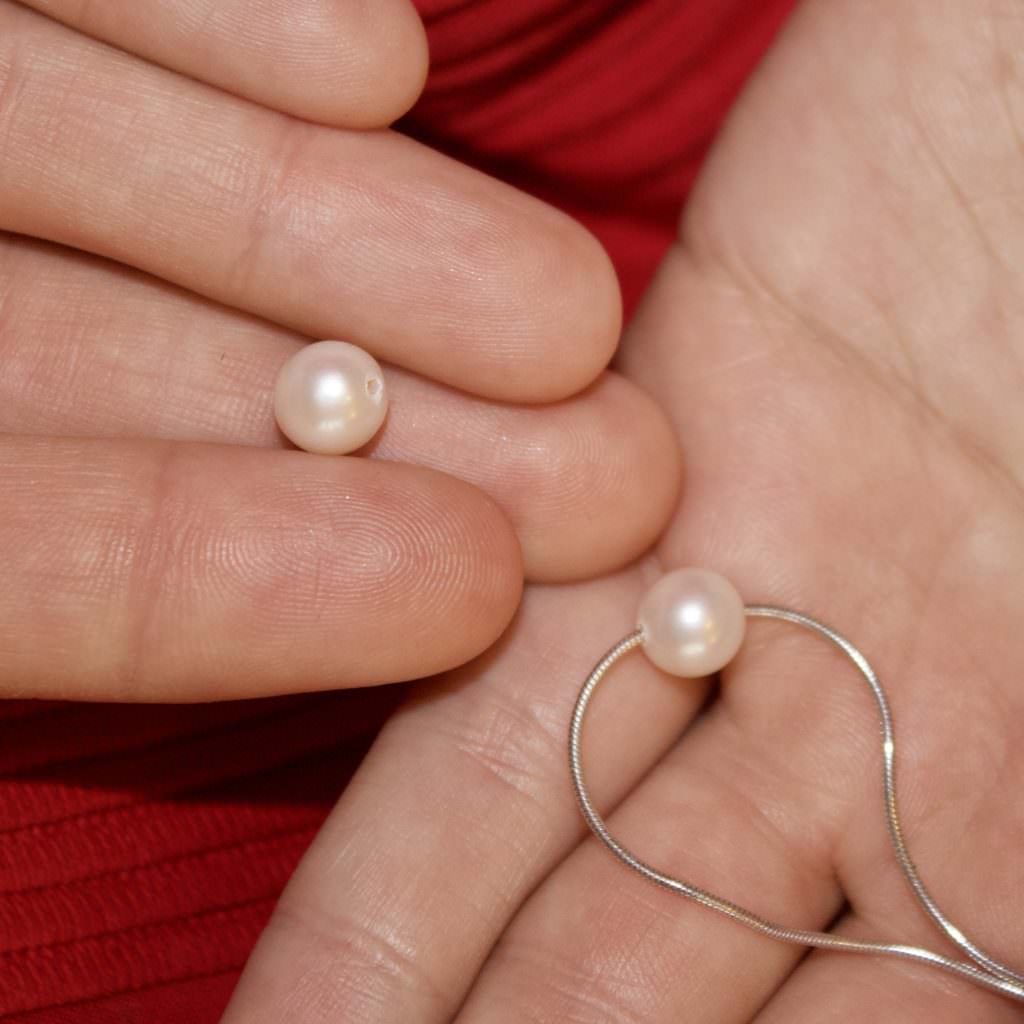 What Is The 'Tooth Test' And Can It Help You Tell If A Pearl Is Real? - TPS  Blog