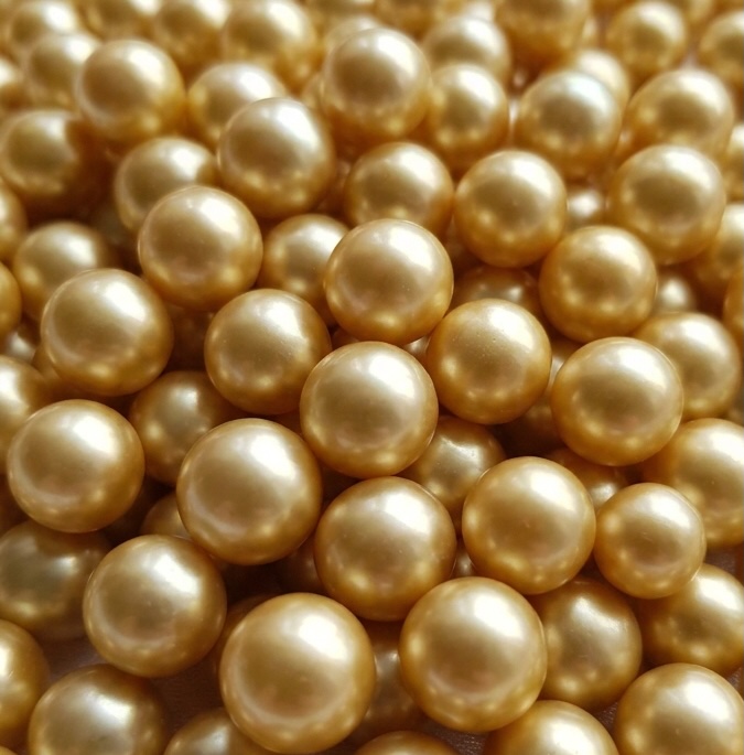 A pile of golden South Sea pearls