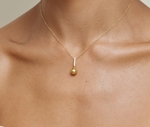 Golden Pearl Dangling Diamond Pendant - Model Image