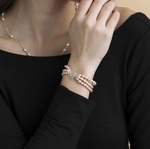 4-5mm Oval Pink Freshwater Pearl Triple Pearl Bracelet - Model Image