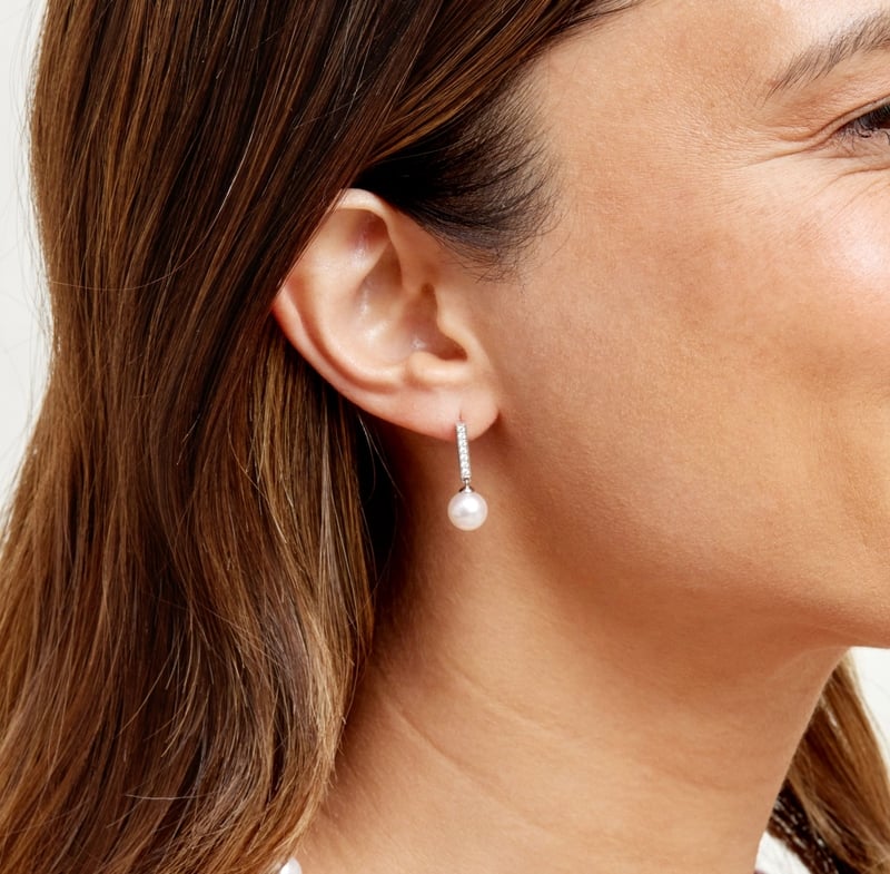 Model is wearing Dangling Diamond earrings with 8.0-8.5mm AAA quality pearls