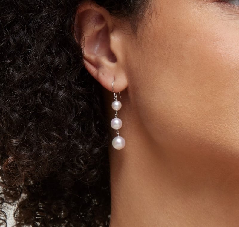 White Akoya Pearl Triple Drop Earrings - Model Image