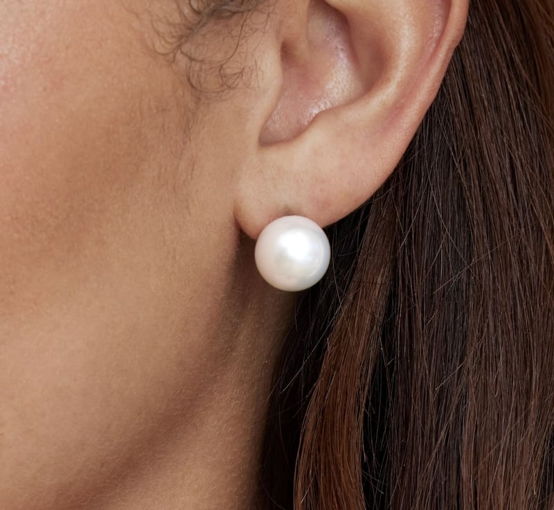 12mm White Freshwater Round Pearl Stud Earrings - Model Image
