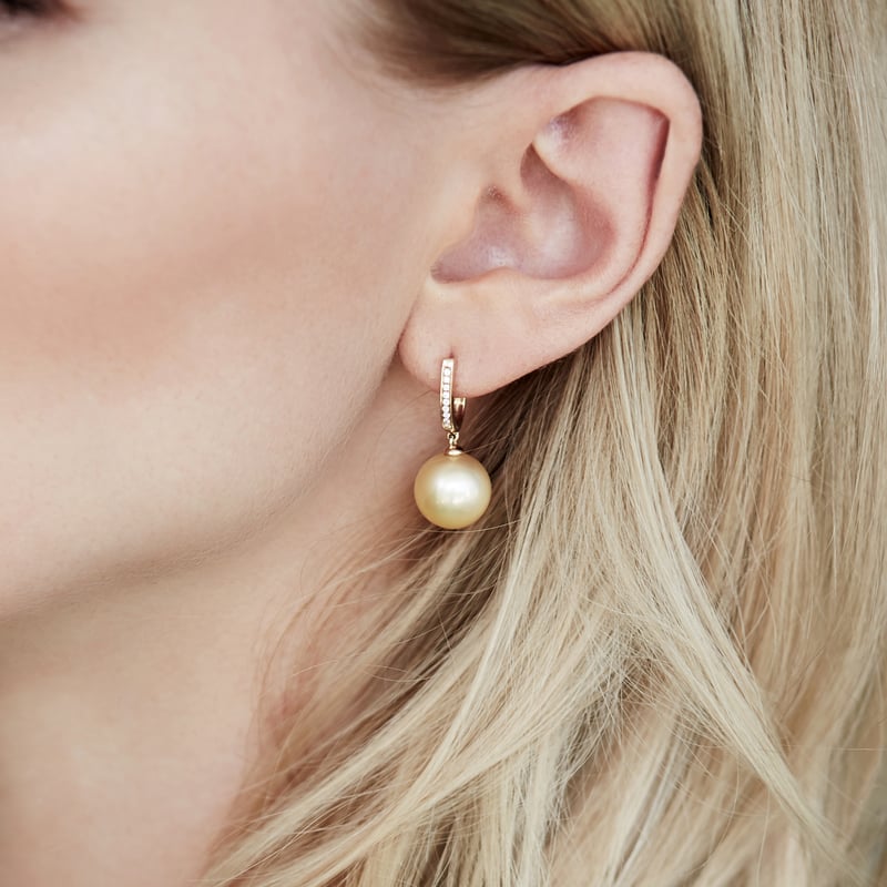 Golden Pearl & Diamond Huggie Aurora Leverback Earrings - Model Image